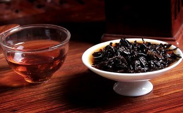 China Smooth Aroma Ripe Puerh Tea , Anti - Aging And Sobering Puerh Tea Brick supplier