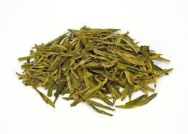China Bagged Fermented organic dragon well tea with very distinctive shape supplier